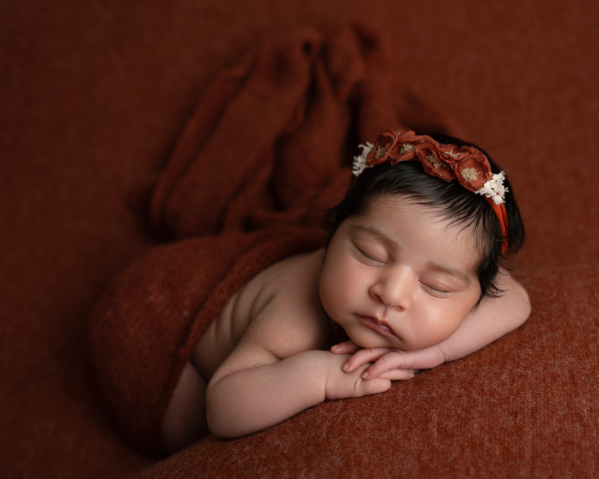 austin newborn photographer burnt orange wrap portrait