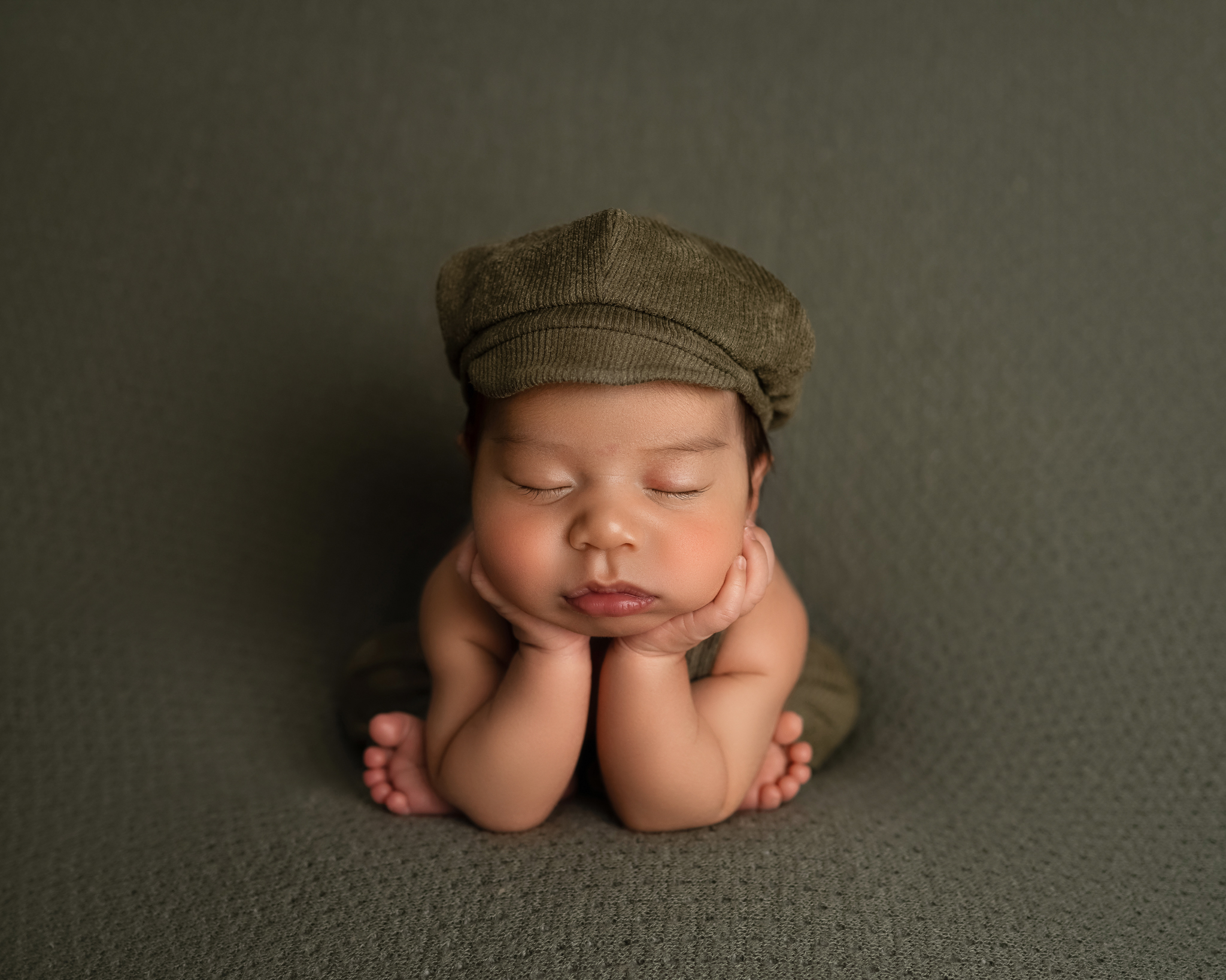newborn boy froggy pose austin photographer