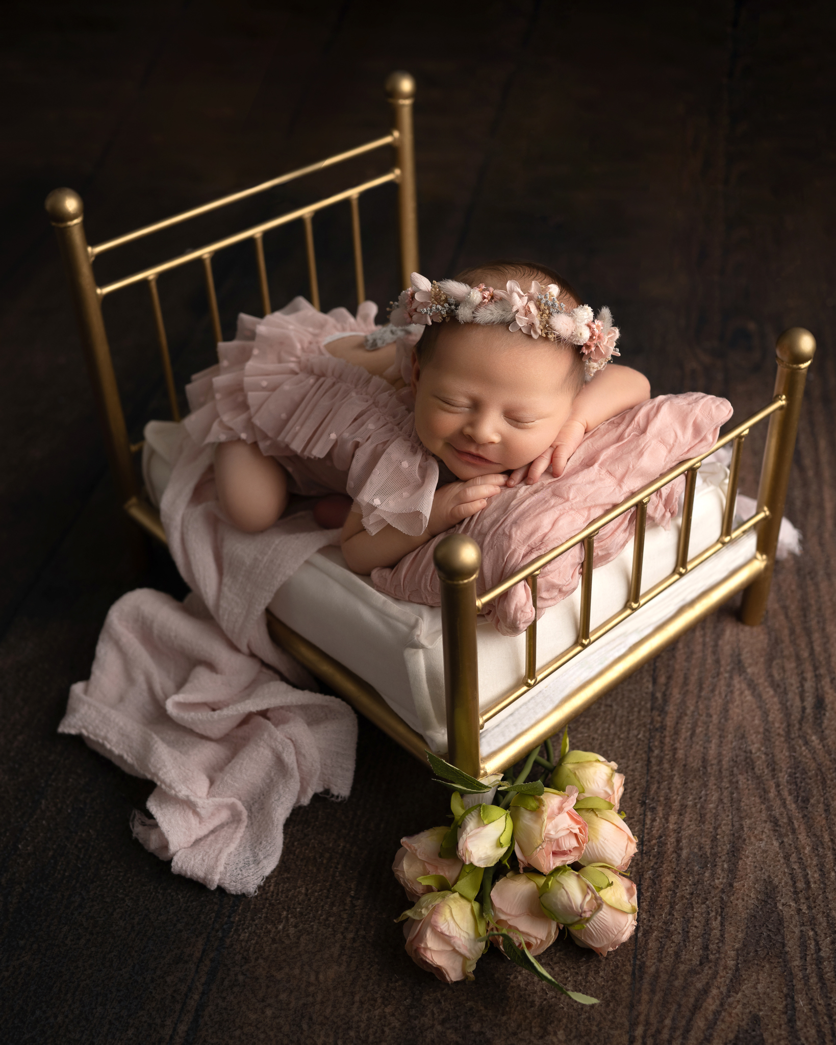 newborn girl gold bed photo austin studio